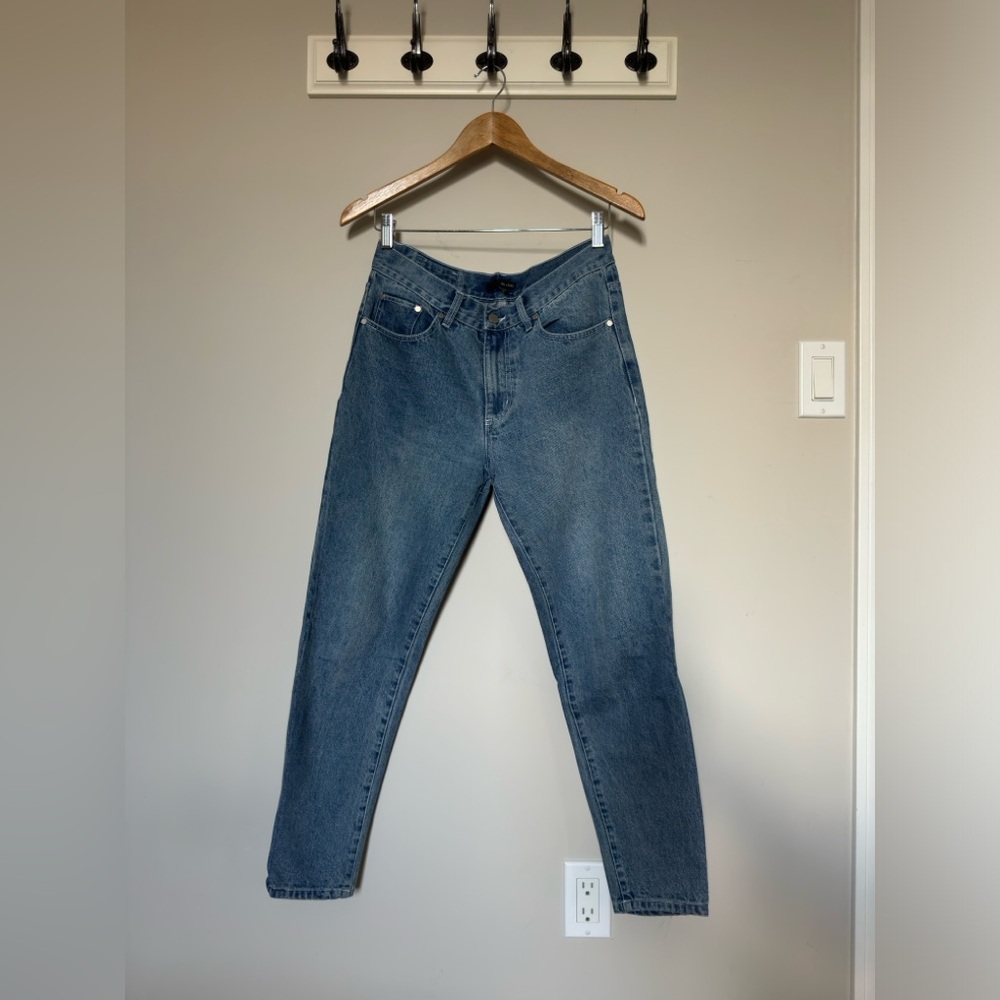 Oak + Fort medium wash jeans.